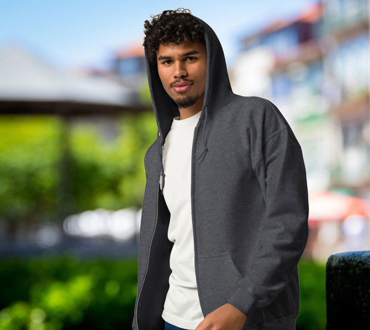 a man in a hoodie is posing for a picture